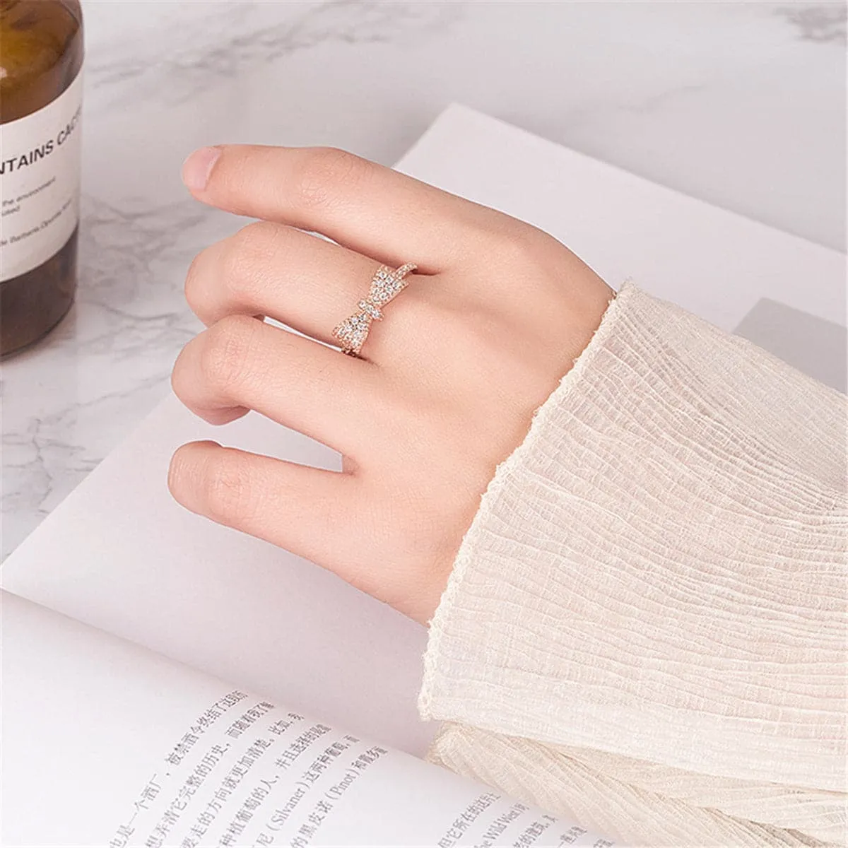 Cubic Zirconia & 18K Rose Gold-Plated Bow Band Ring